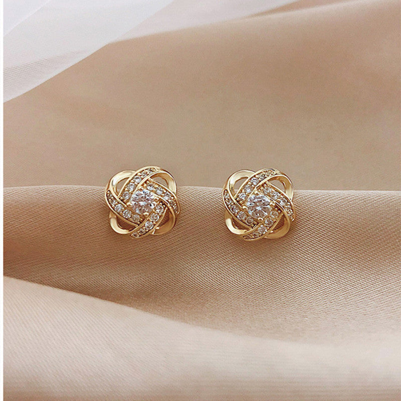 Pendientes de cruz con diamantes