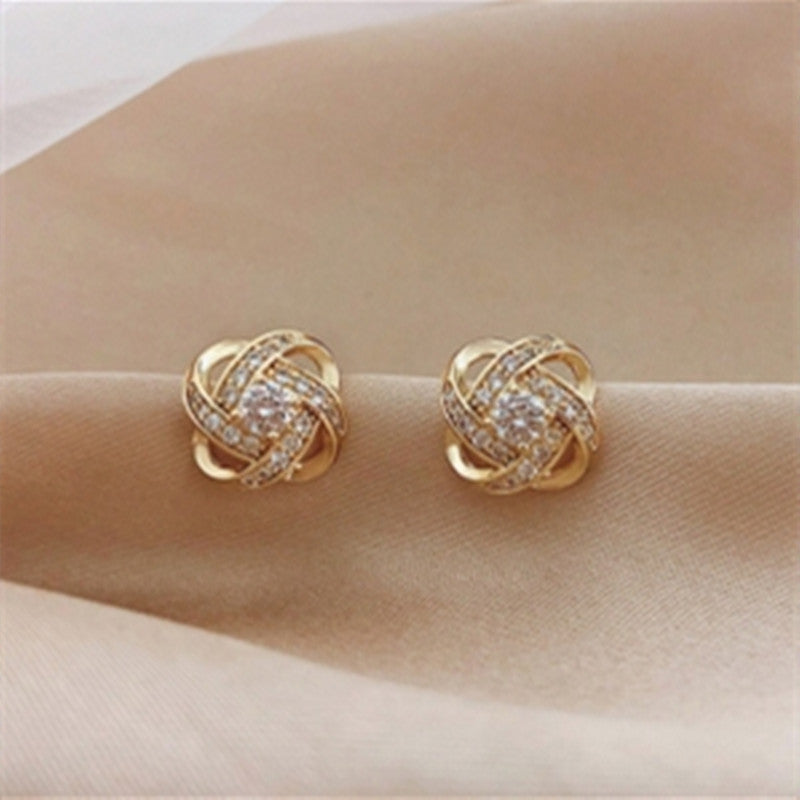 Pendientes de cruz con diamantes