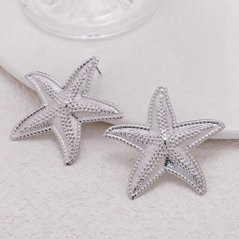 Pendientes con forma de estrella de mar elegante