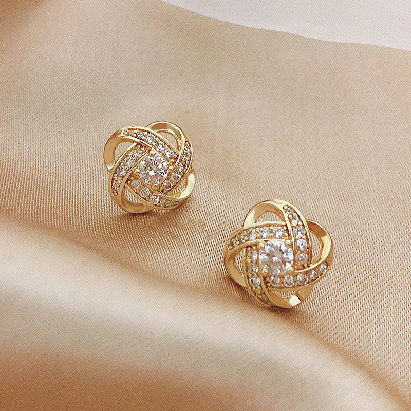 Pendientes de cruz con diamantes