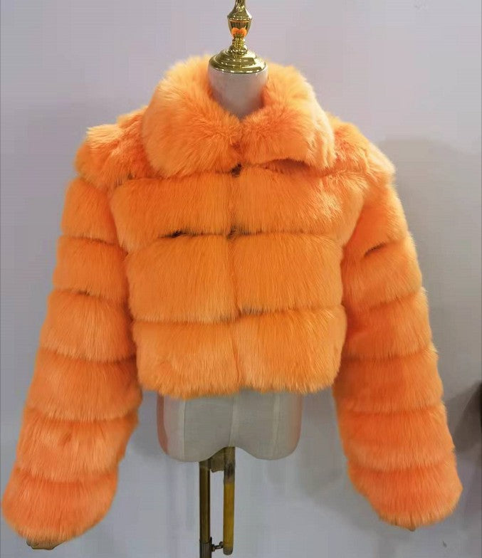 Abrigo de mujer de piel sintetica con cuello de solapa