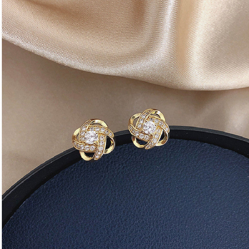 Pendientes de cruz con diamantes