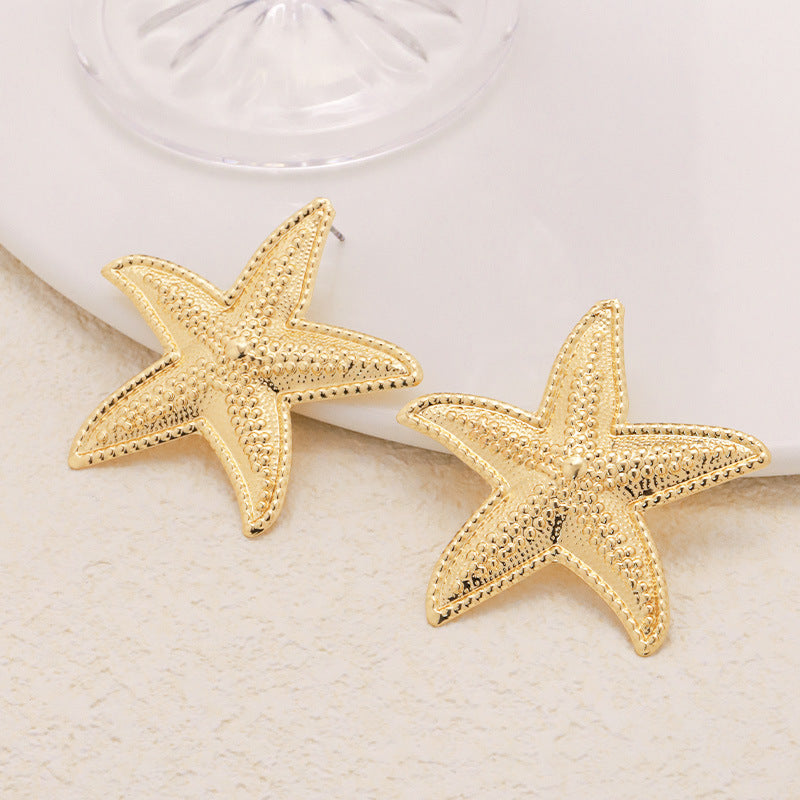 Pendientes con forma de estrella de mar elegante